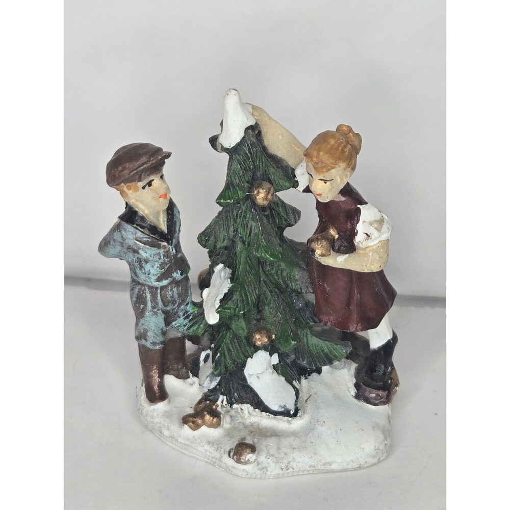 Miniature Figurine Man and Women at Evergreen Tree Snow Christmas Village
